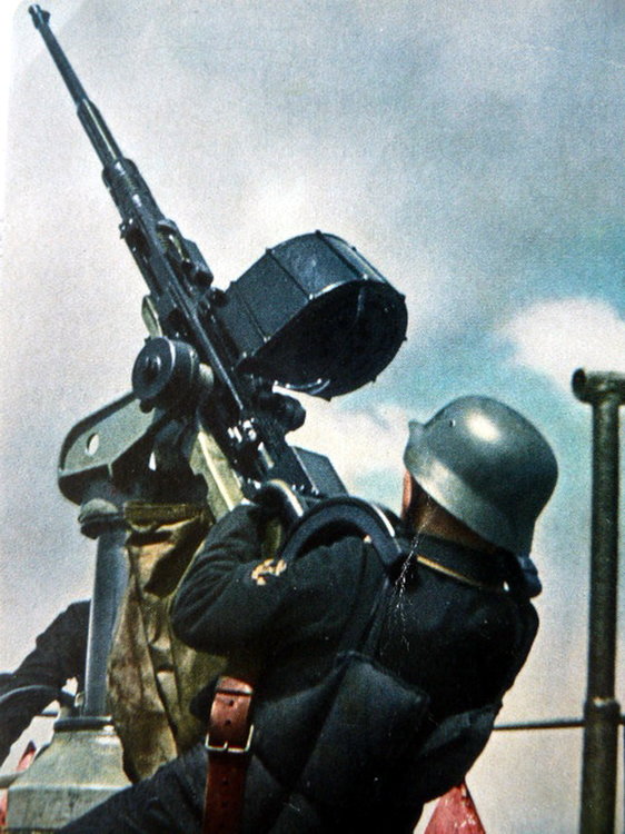 Eastern Front. Protection from air attack. Gunner at sea pointing weapon into the sky corbis.jpg